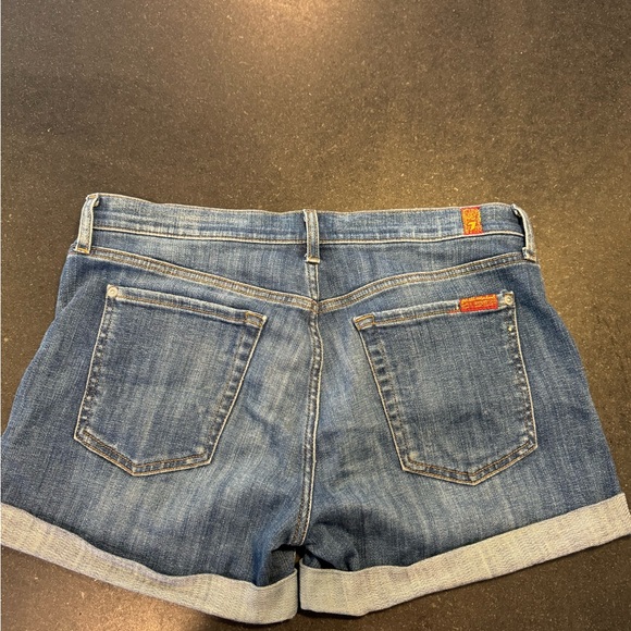 7 FOR ALL MANKIND Medium Wash Distressed Cuffed Relax Fit Denim Shorts - Picture 3 of 4